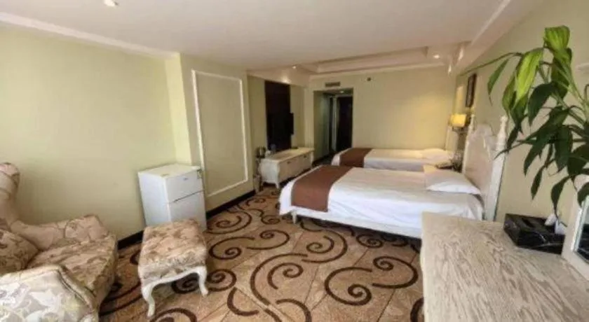 Bed in Longda Ruiji Business Hotel Harbin