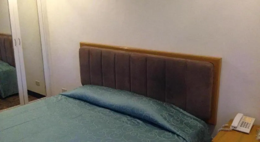 Bed in Bayfront Hotel Subic