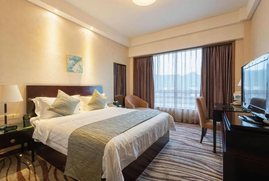 Bed in Jiande Peninsula Kaihao Hotel