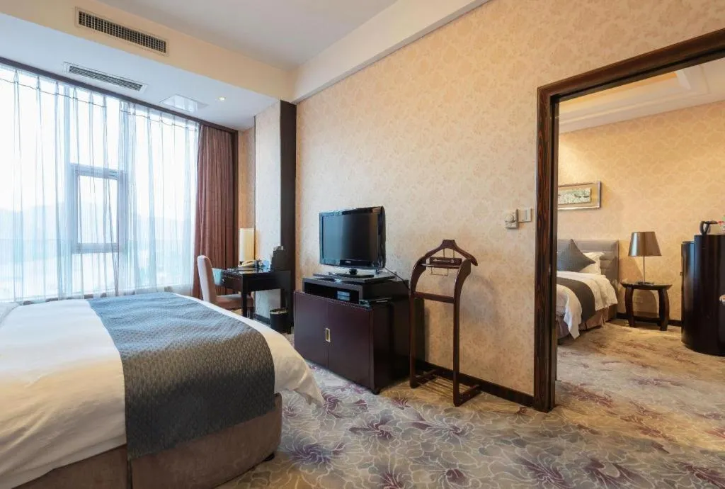 Bed in Jiande Peninsula Kaihao Hotel