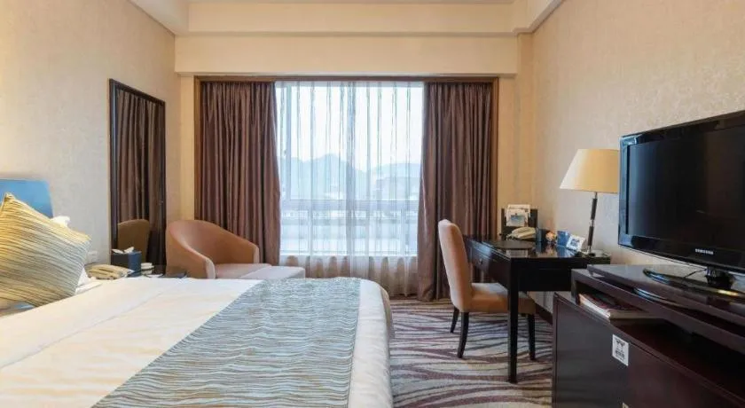 Bed in Jiande Peninsula Kaihao Hotel