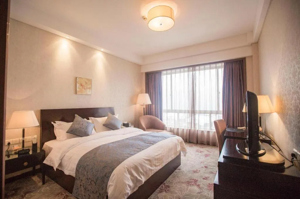 Bed in Jiande Peninsula Kaihao Hotel