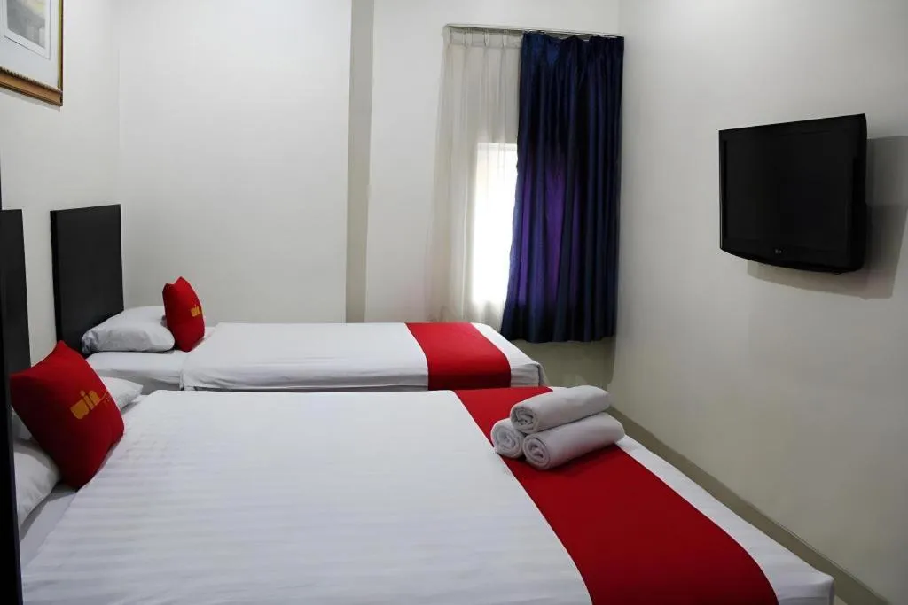 Bed in Win Hotel Blok M