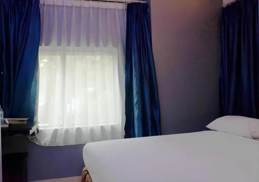 Bed in Win Hotel Blok M