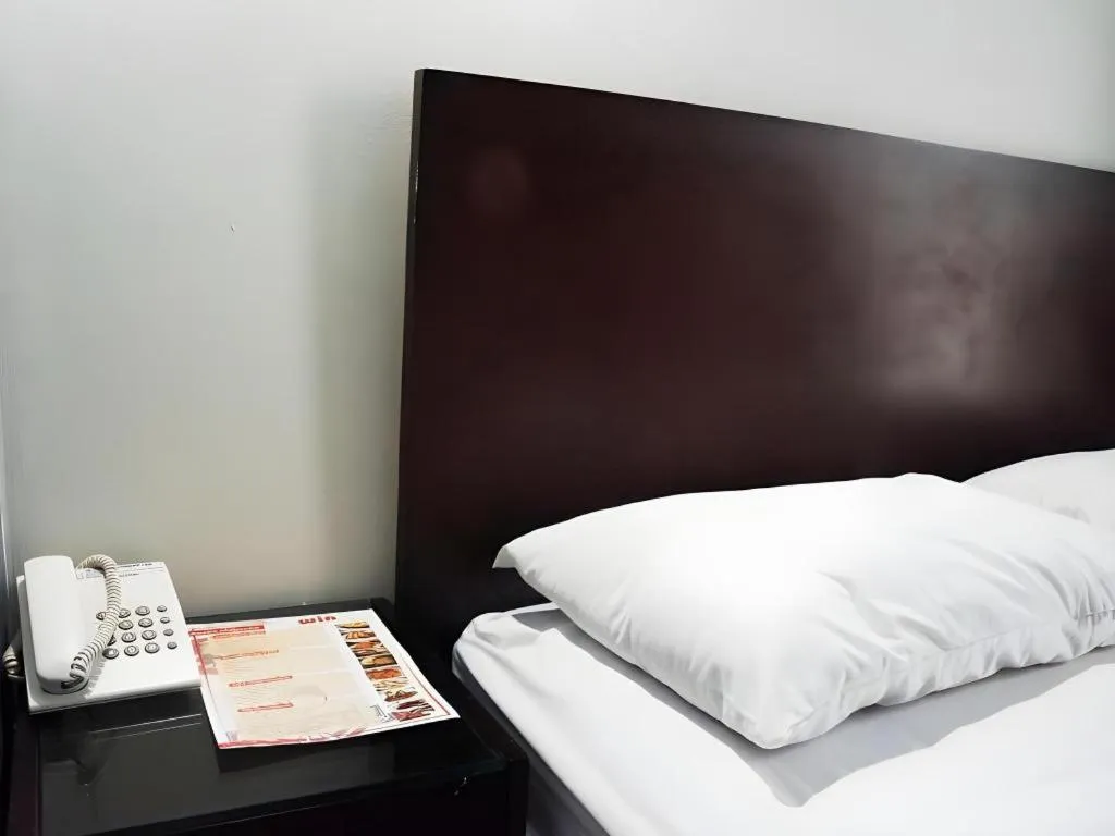 Bed in Win Hotel Blok M