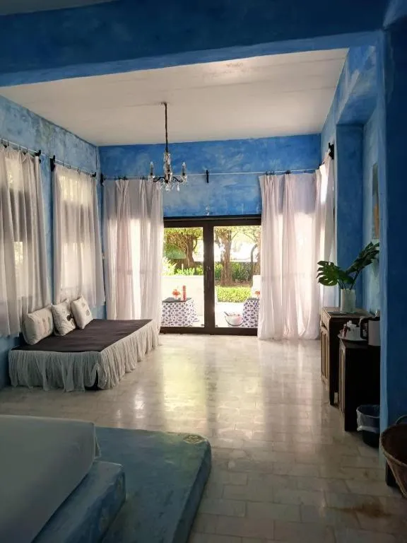 Bed in Brassiere Beach Hotel