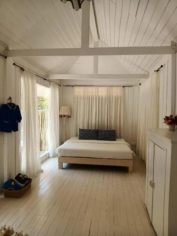 Bed in Brassiere Beach Hotel