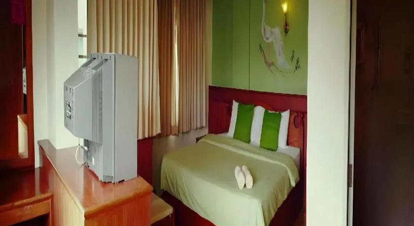 Bed in Loei Orchid Hotel