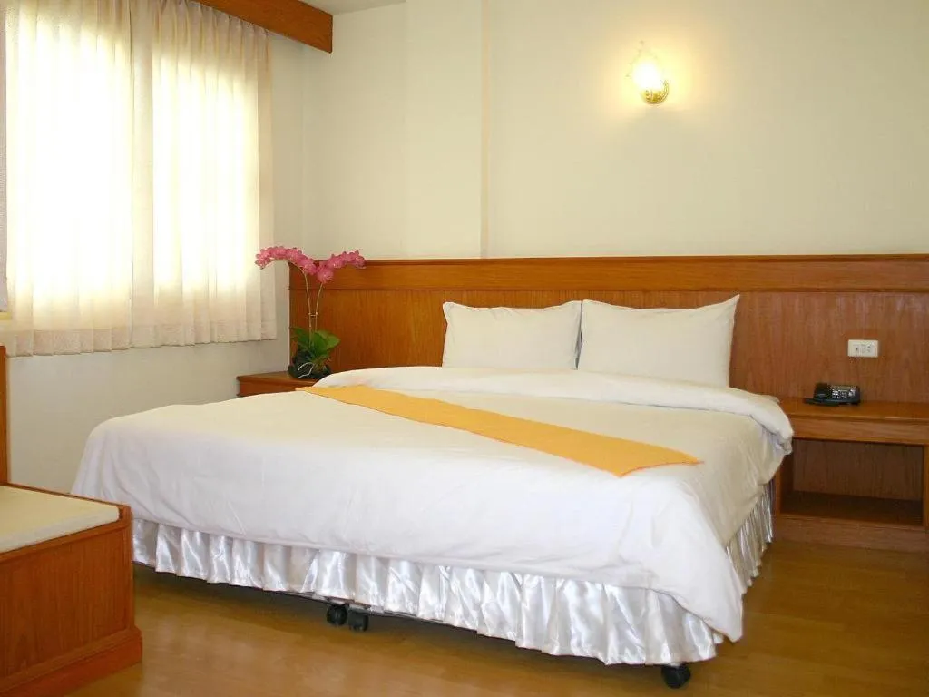 Bed in Loei Orchid Hotel