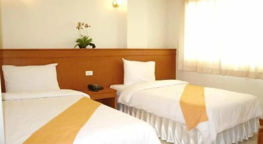 Bed in Loei Orchid Hotel