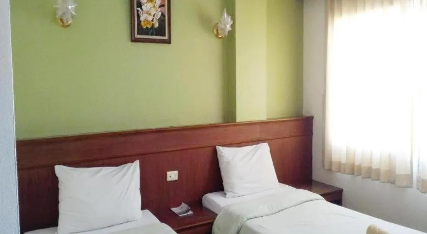 Bed in Loei Orchid Hotel