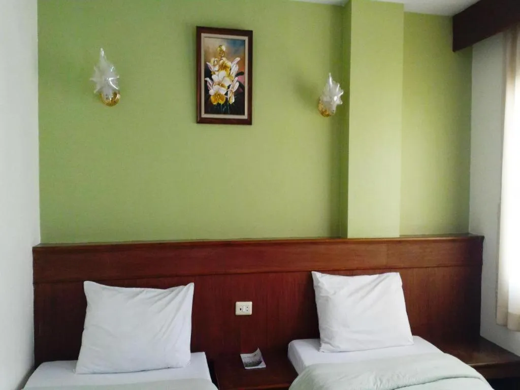 Bed in Loei Orchid Hotel