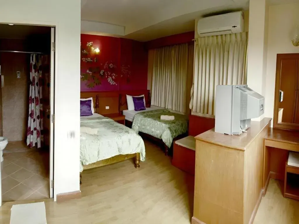 Bed in Loei Orchid Hotel Bed in Loei Orchid Hotel