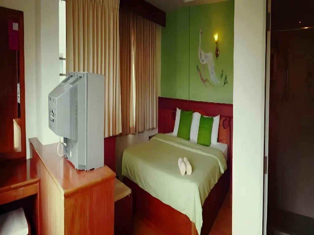 Bed in Loei Orchid Hotel