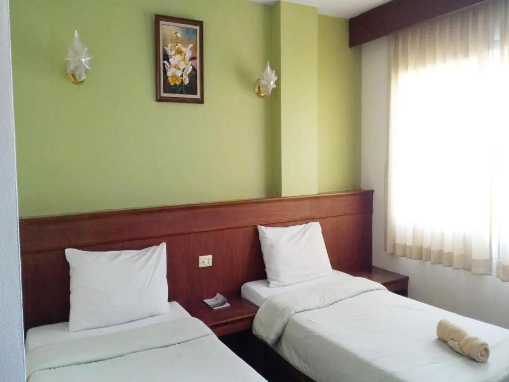 Bed in Loei Orchid Hotel