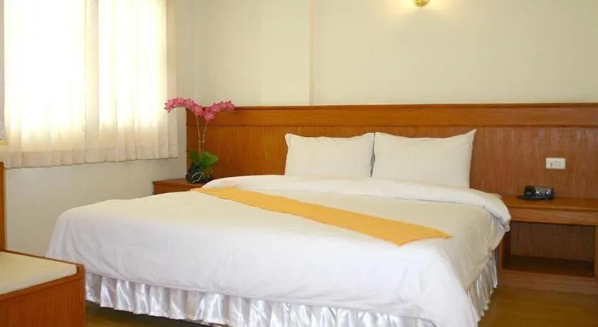 Bed in Loei Orchid Hotel