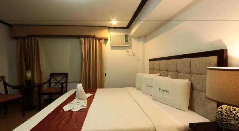 Bed in D' Leonor Hotel