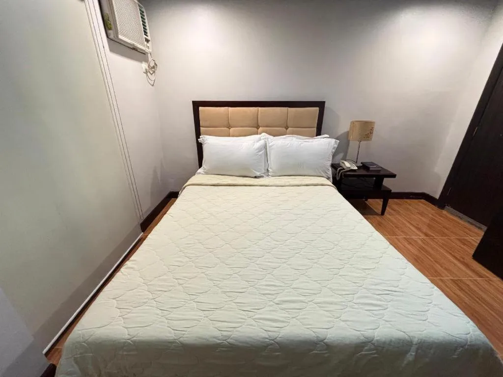 Bed in D' Leonor Hotel