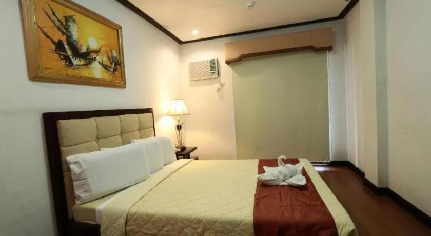 Bed in D' Leonor Hotel