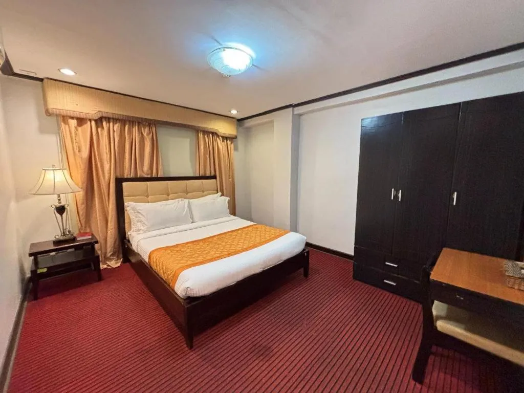 Bed in D' Leonor Hotel