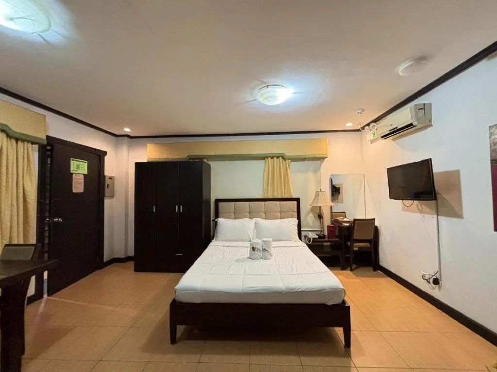 Bed in D' Leonor Hotel