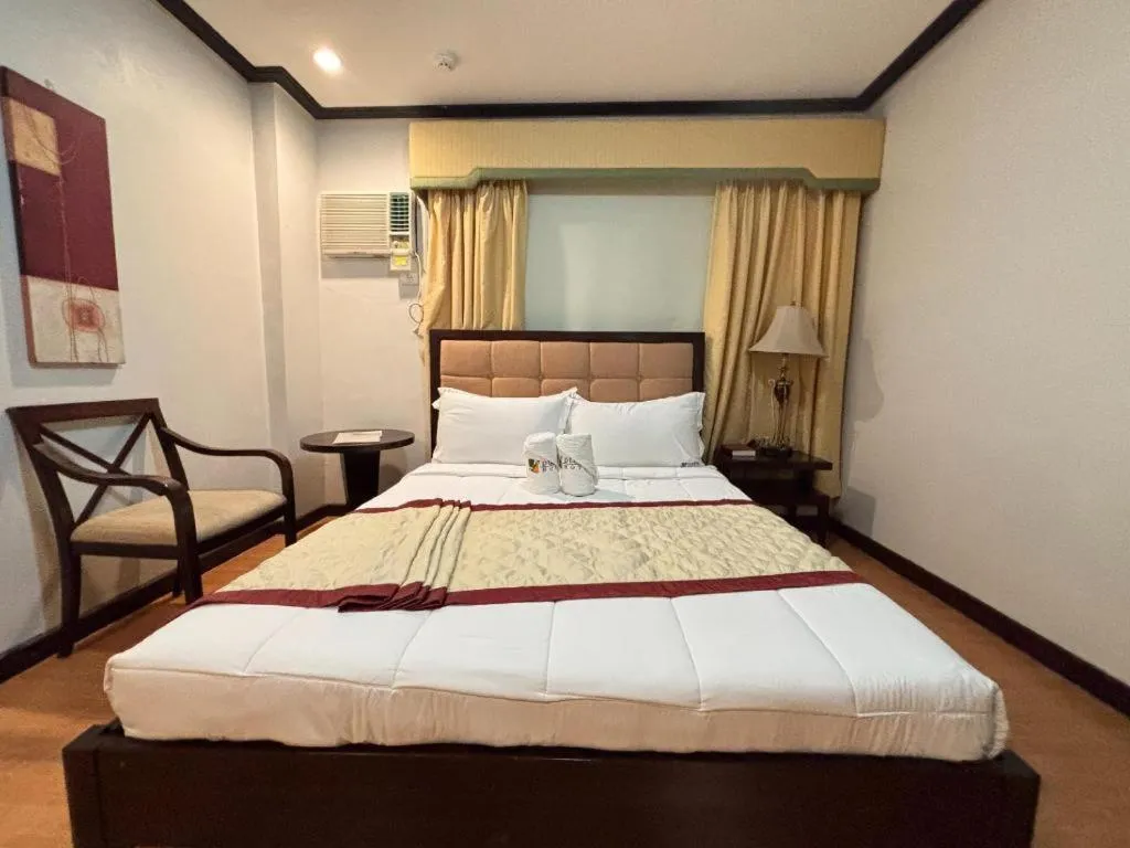 Bed in D' Leonor Hotel