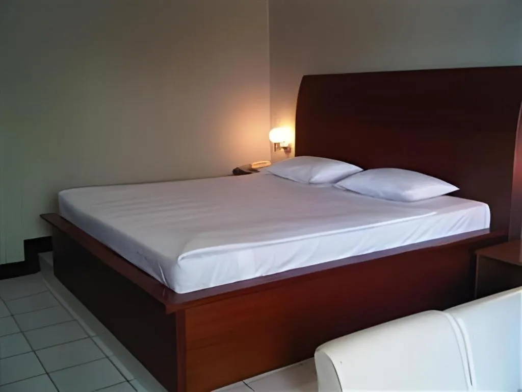 Bed in Hotel Minahasa