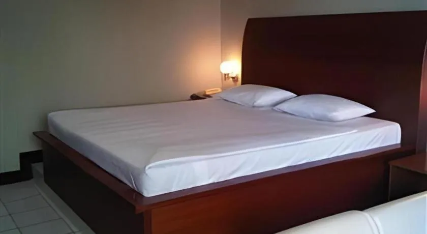 Bed in Hotel Minahasa