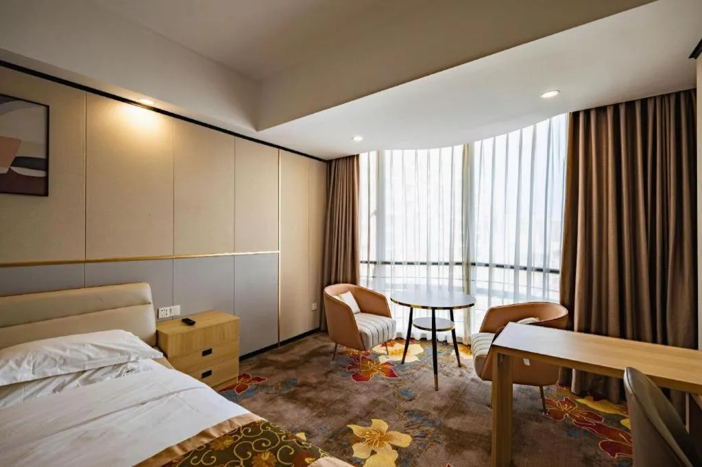 Bed in Wuhan Newport International Hotel