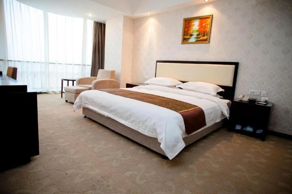 Bed in Wuhan Newport International Hotel