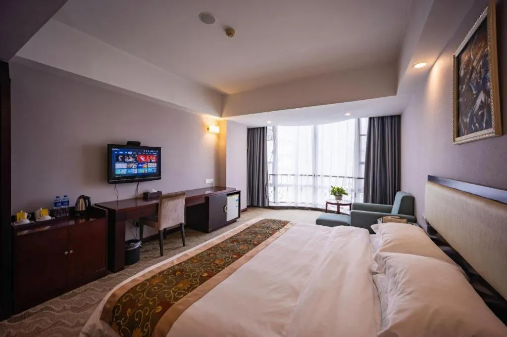 Bed in Wuhan Newport International Hotel