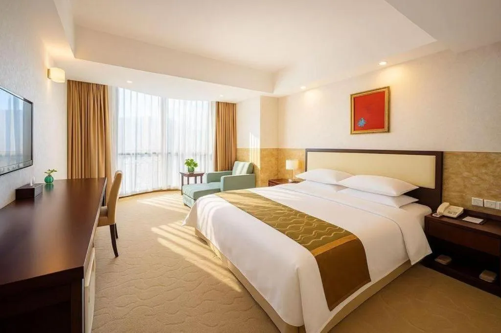 Bed in Wuhan Newport International Hotel
