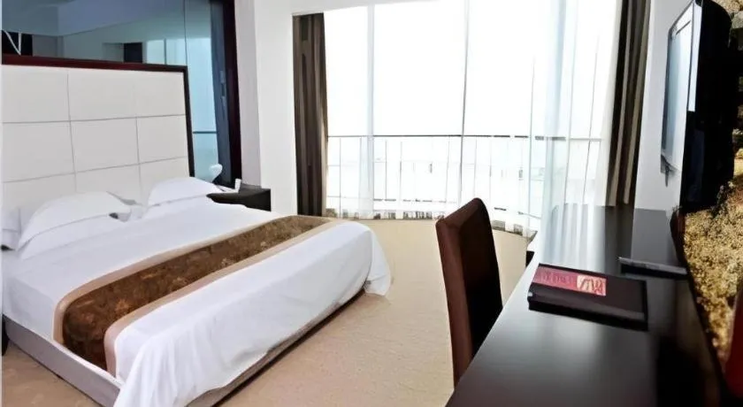 Bed in Wuhan Newport International Hotel