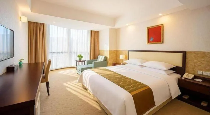 Bed in Wuhan Newport International Hotel