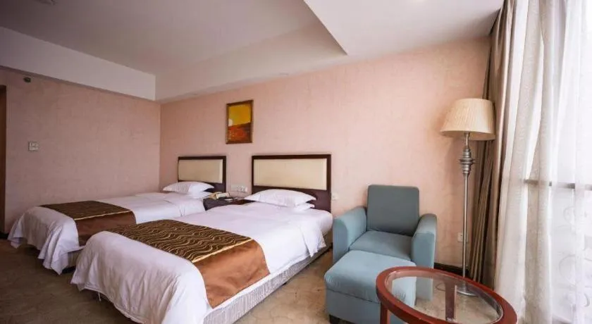 Bed in Wuhan Newport International Hotel