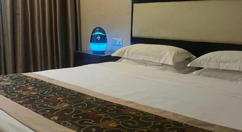 Bed in Wuhan Newport International Hotel