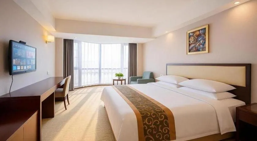 Bed in Wuhan Newport International Hotel