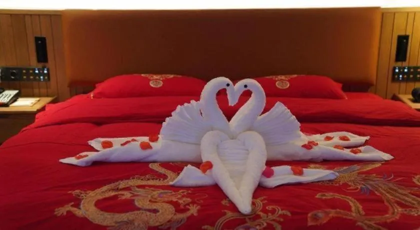 Bed in Dongguan Castfast Hotel