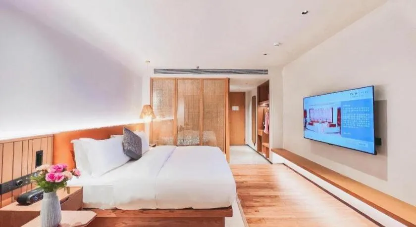 Bed in Dongguan Castfast Hotel