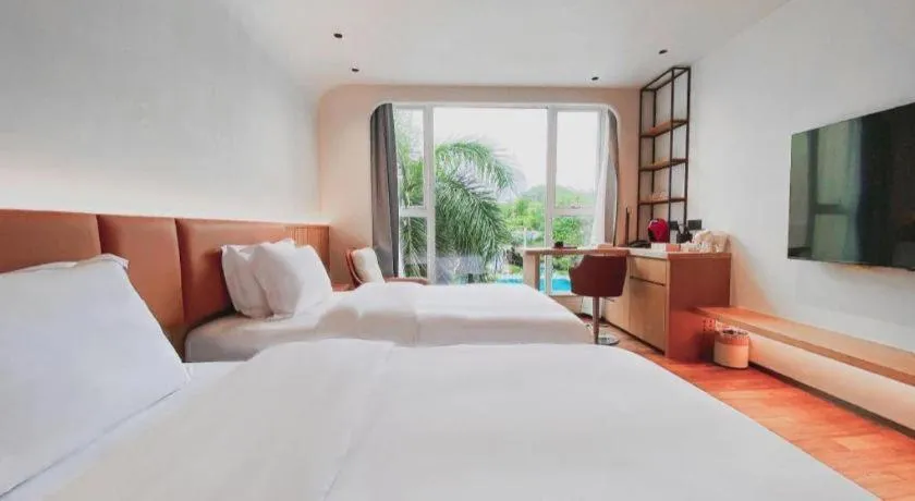 Bed in Dongguan Castfast Hotel