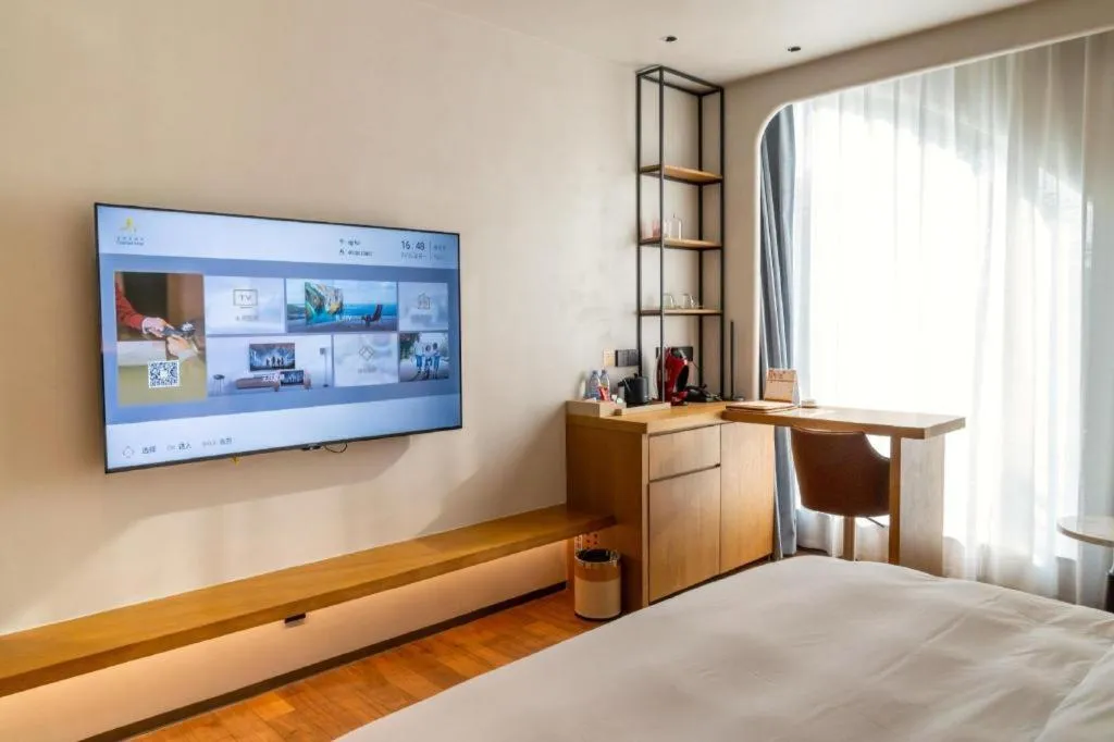 Bed in Dongguan Castfast Hotel