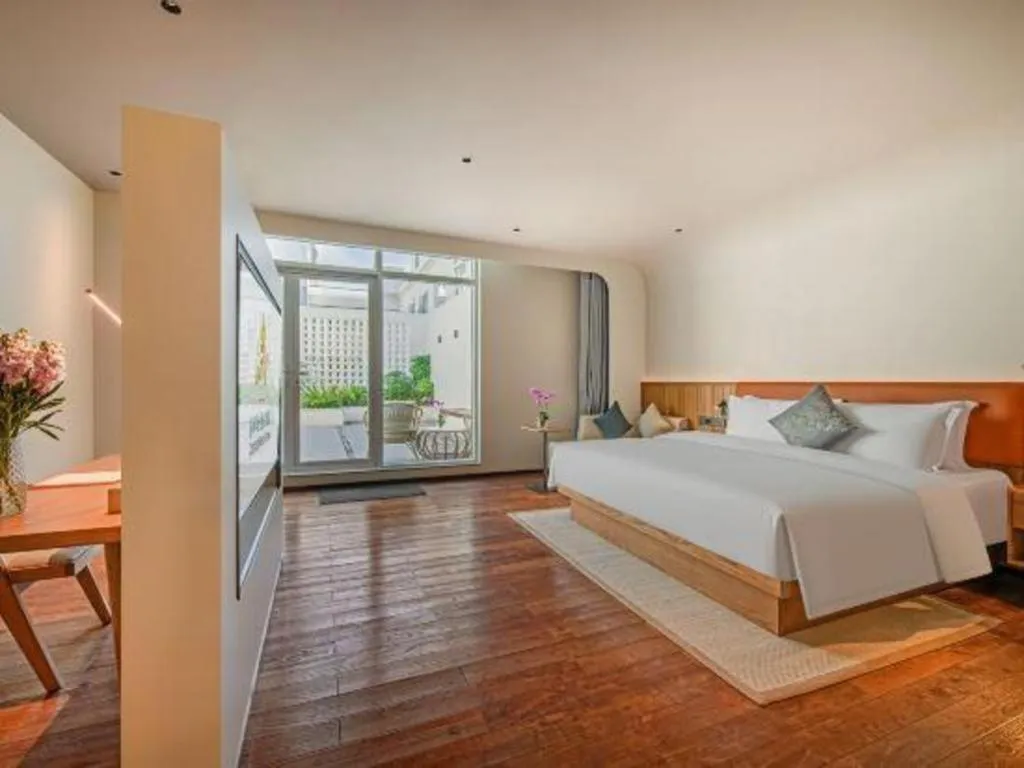 Bed in Dongguan Castfast Hotel