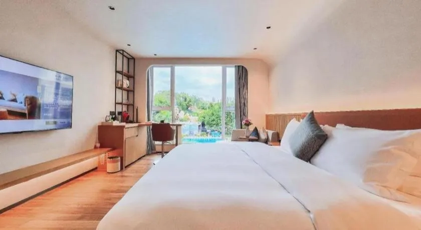 Bed in Dongguan Castfast Hotel