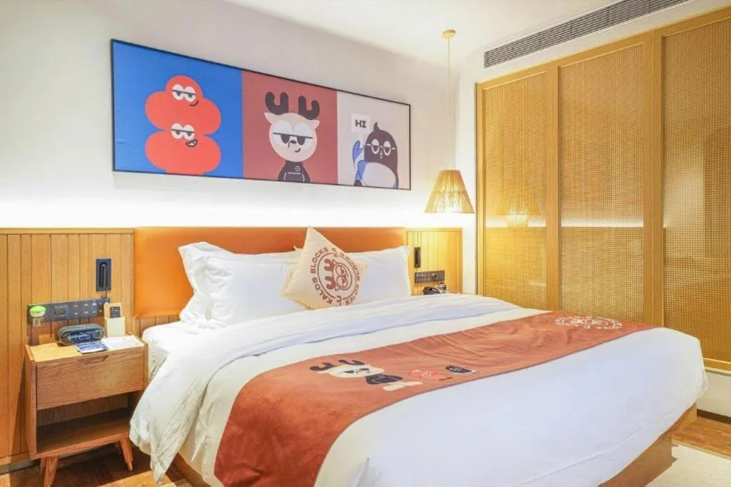 Bed in Dongguan Castfast Hotel