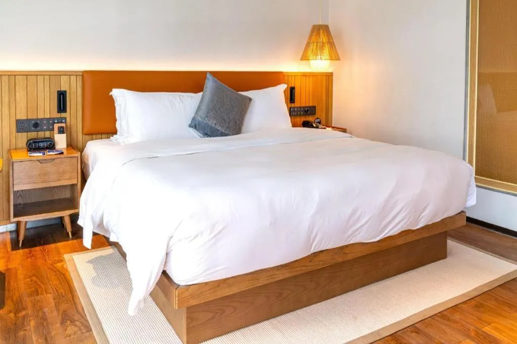 Bed in Dongguan Castfast Hotel