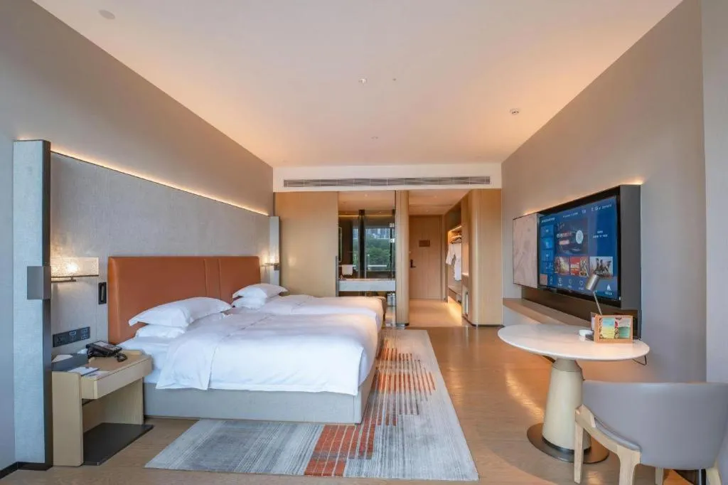 Bed in Dongguan Castfast Hotel