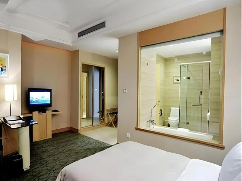 Bed in Dongguan Castfast Hotel