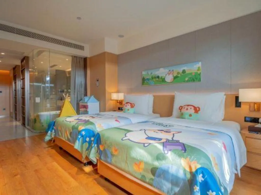 Bed in Dongguan Castfast Hotel