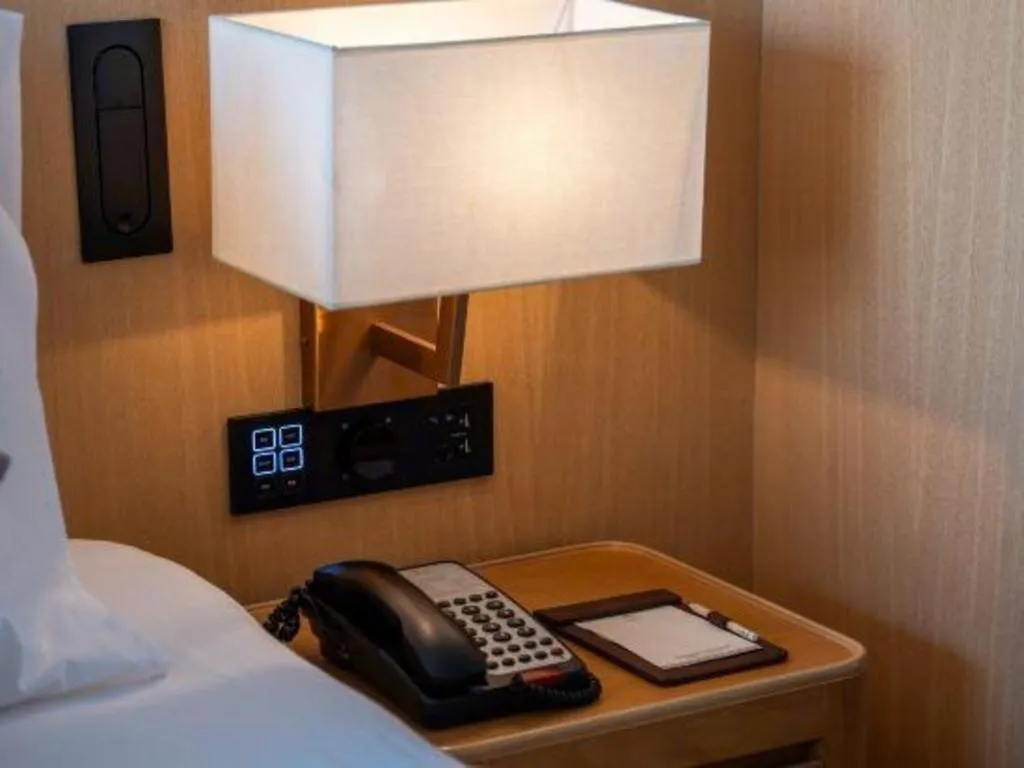 Bed in Dongguan Castfast Hotel