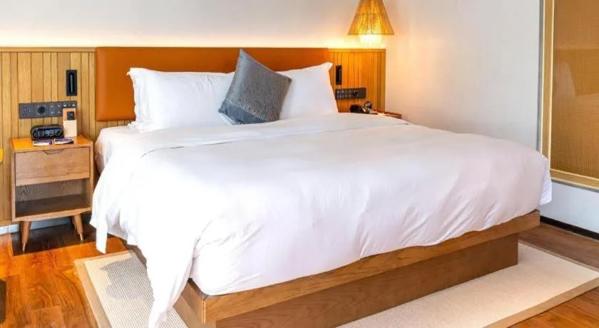 Bed in Dongguan Castfast Hotel